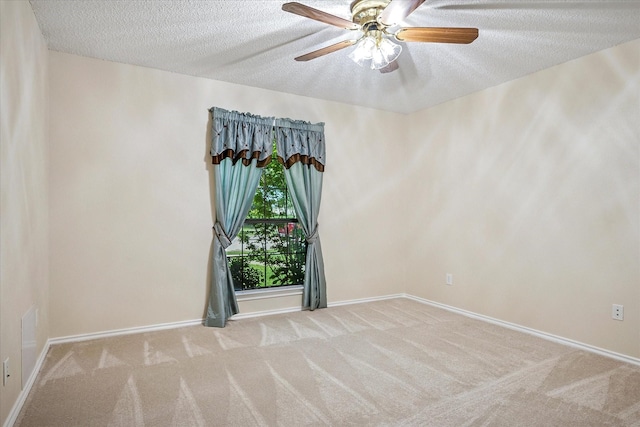 4120 Merriman Dr, Plano, TX 75074 - carpeted spare room featuring a textured ceiling and ceiling fan