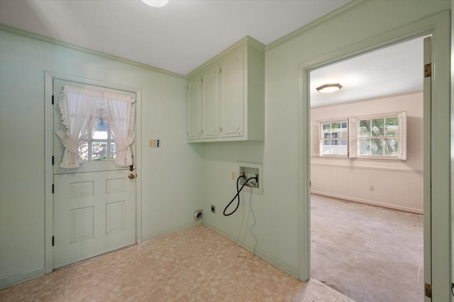1008 Dobbins Rd, Corsicana, TX 75110 - laundry room featuring cabinet space, healthy amount of natural light, hookup for a washing machine, light flooring, and ornamental molding