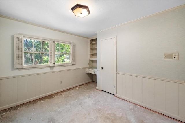 1008 Dobbins Rd, Corsicana, TX 75110 - unfurnished bedroom with wainscoting and ornamental molding