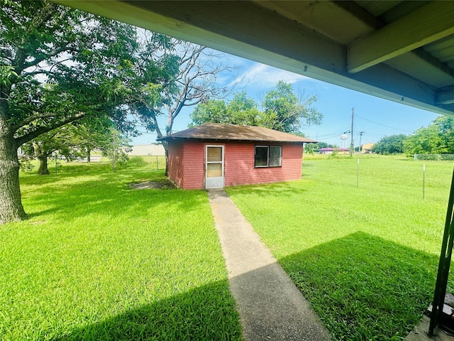 1220 Crestview Dr, Kaufman, TX 75142 - view of grassy yard with an outdoor structure