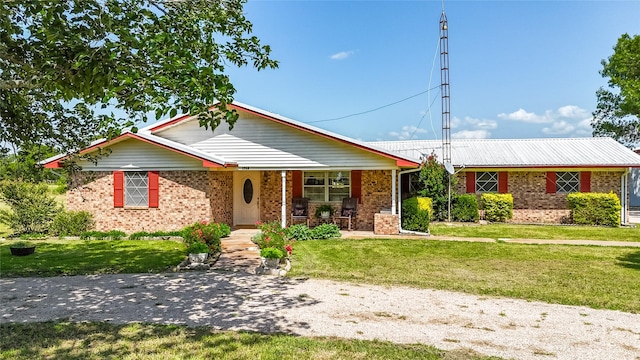 1748 Old Southmayd Rd, Sherman, TX 75092 - ranch-style house featuring covered porch, brick siding, and a front lawn