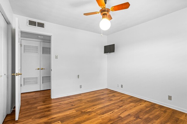 1748 Old Southmayd Rd, Sherman, TX 75092 - unfurnished bedroom with wood finished floors, a ceiling fan, and a closet