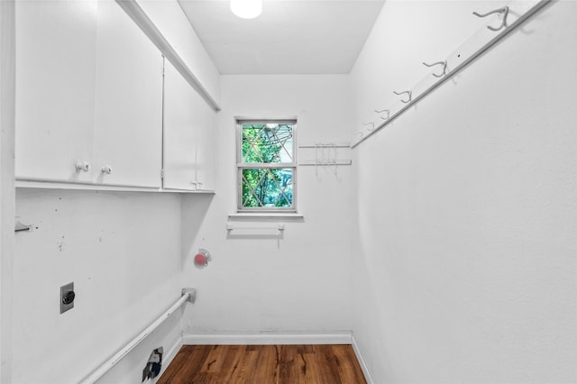 1748 Old Southmayd Rd, Sherman, TX 75092 - laundry area featuring cabinet space, dark wood finished floors, and hookup for an electric dryer
