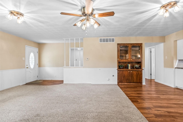 1748 Old Southmayd Rd, Sherman, TX 75092 - unfurnished living room with wainscoting, a ceiling fan, and wood finished floors
