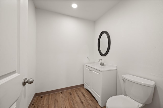 13431 Kira Ln, Justin, TX 76247 - half bath featuring vanity and wood finished floors