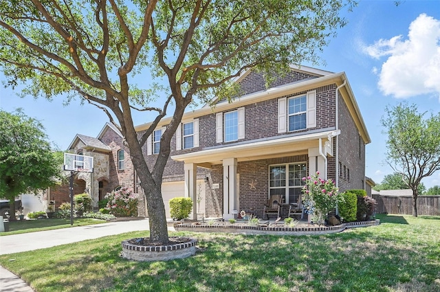 1000 Barn Owl Dr, Little Elm, TX 75068 - view of front of property featuring brick siding, covered porch, and driveway