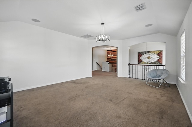 1000 Barn Owl Dr, Little Elm, TX 75068 - unfurnished dining area with lofted ceiling, carpet floors, and arched walkways