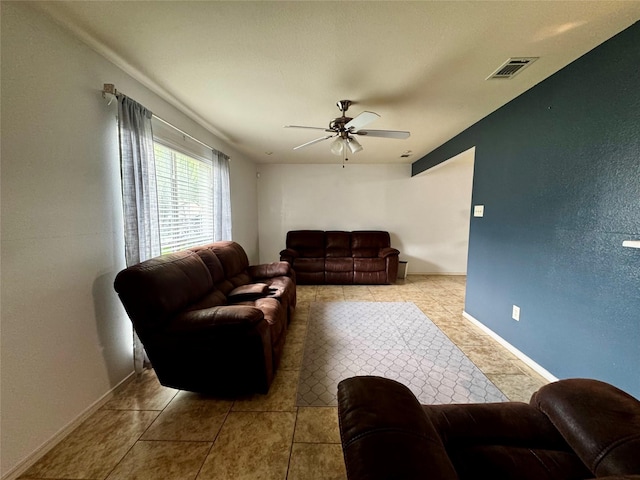 2648 Mark Dr, Mesquite, TX 75150 - living room with a ceiling fan and baseboards