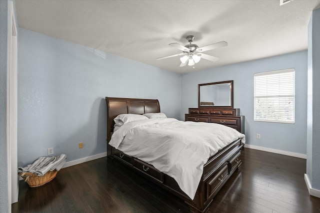 2648 Mark Dr, Mesquite, TX 75150 - bedroom with dark wood finished floors and ceiling fan
