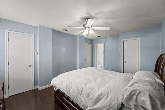 2648 Mark Dr, Mesquite, TX 75150 - bedroom featuring dark wood-type flooring, a ceiling fan, and ensuite bath