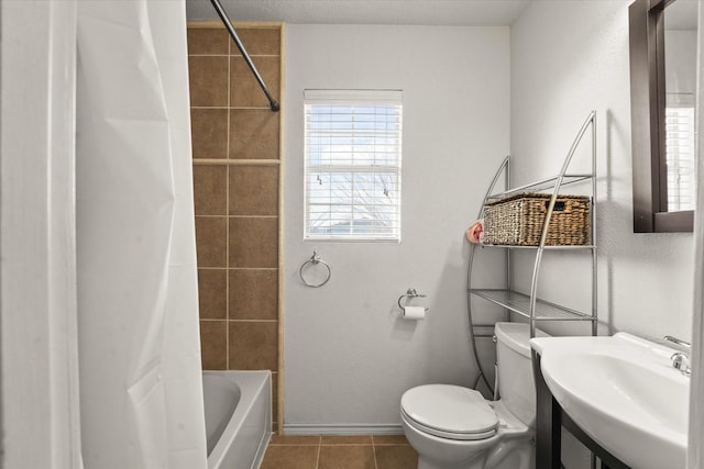 2648 Mark Dr, Mesquite, TX 75150 - bathroom with healthy amount of natural light, tile patterned floors, and shower / bath combo with shower curtain