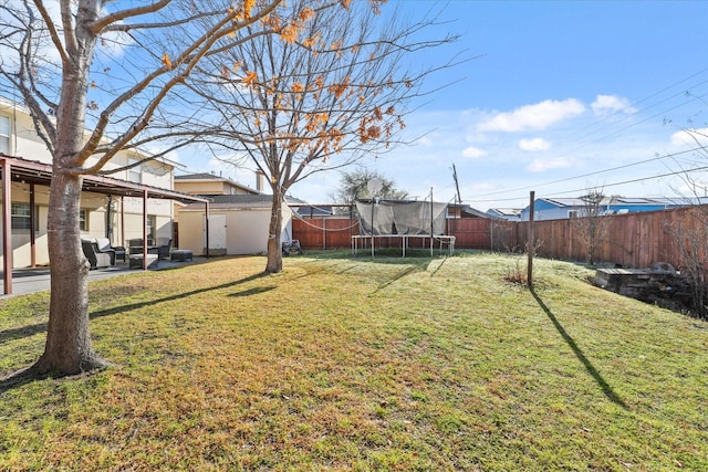 2648 Mark Dr, Mesquite, TX 75150 - fenced backyard featuring a trampoline, a shed, an outdoor living space, and a patio