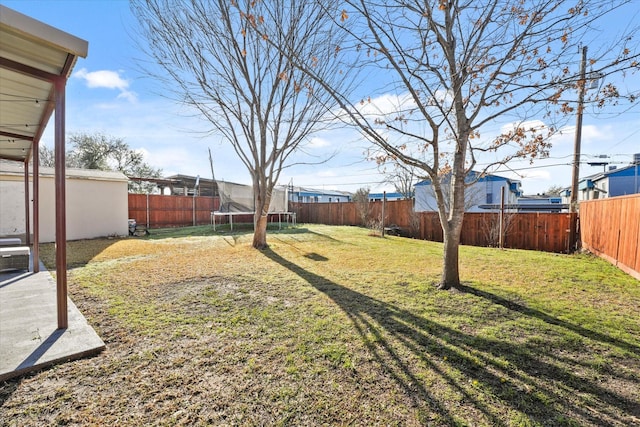2648 Mark Dr, Mesquite, TX 75150 - fenced backyard with a trampoline