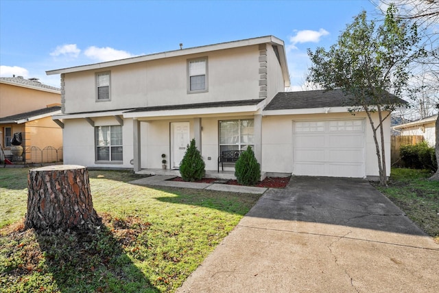 2648 Mark Dr, Mesquite, TX 75150 - traditional-style home featuring an attached garage, driveway, a porch, and stucco siding