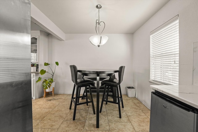 2648 Mark Dr, Mesquite, TX 75150 - dining space featuring healthy amount of natural light and light tile patterned flooring