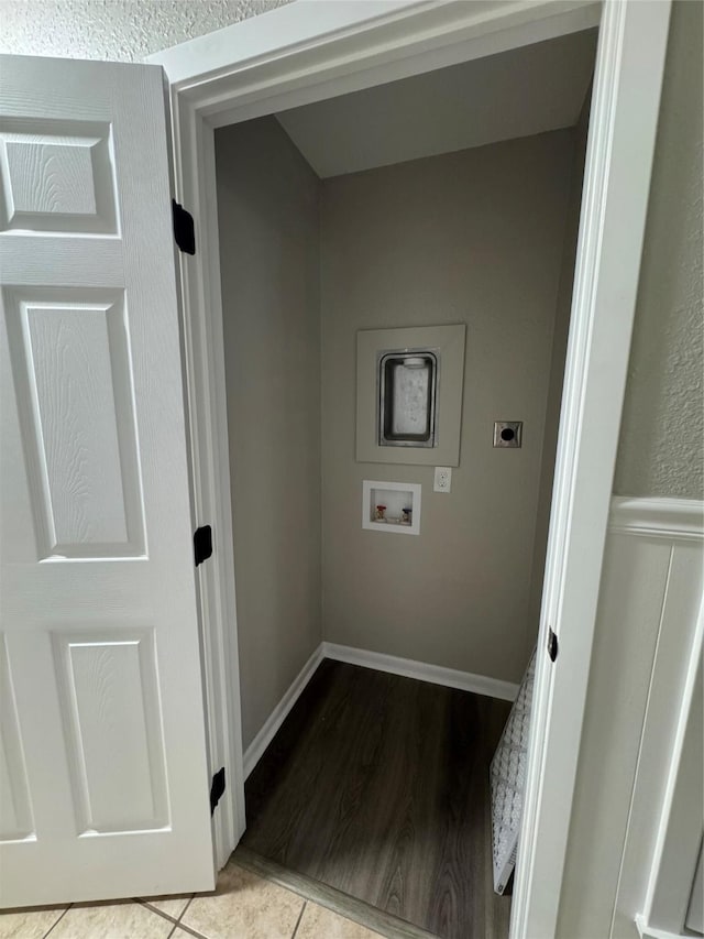 2410 W Collin St, Corsicana, TX 75110 - washroom featuring electric dryer hookup, washer hookup, and tile patterned flooring