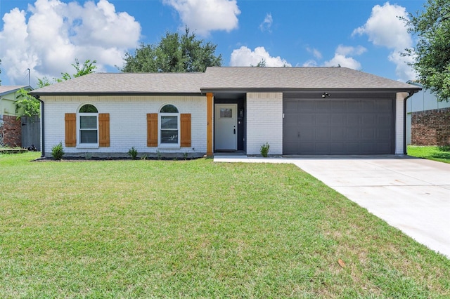 7116 Chapman Dr, North Richland Hills, TX 76182 - single story home with concrete driveway, a garage, brick siding, a front lawn, and roof with shingles