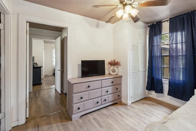 601 E San Saba St, Wortham, TX 76693 - bedroom featuring wood finished floors and a ceiling fan