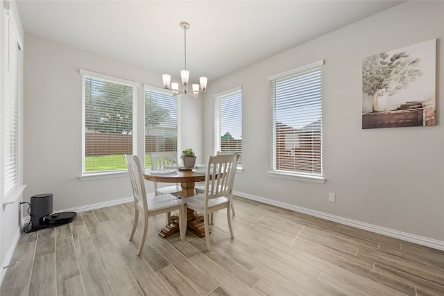1420 Whitetail Ln, Azle, TX 76020 - dining space featuring plenty of natural light, a chandelier, and light wood-type flooring