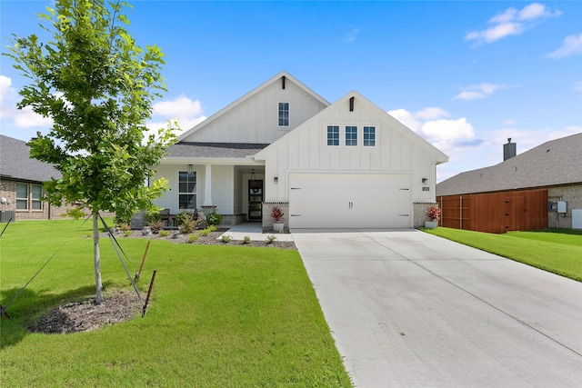 1420 Whitetail Ln, Azle, TX 76020 - modern farmhouse with board and batten siding, concrete driveway, a front lawn, and a shingled roof