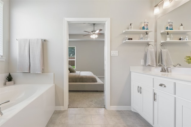 1420 Whitetail Ln, Azle, TX 76020 - ensuite bathroom with a ceiling fan, vanity, a garden tub, and tile patterned flooring