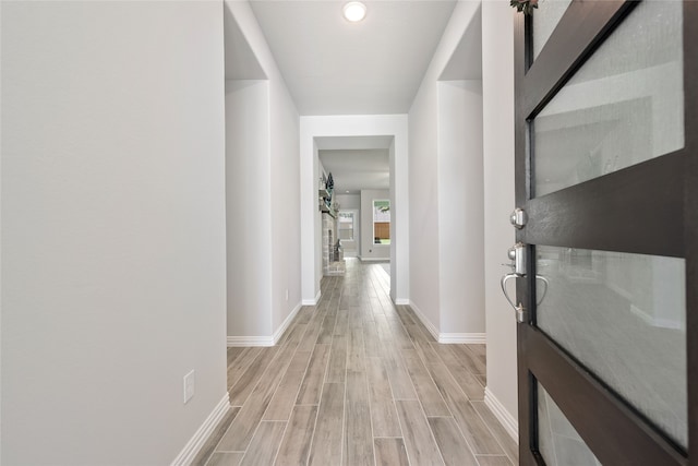 1420 Whitetail Ln, Azle, TX 76020 - corridor featuring light wood-style floors and baseboards