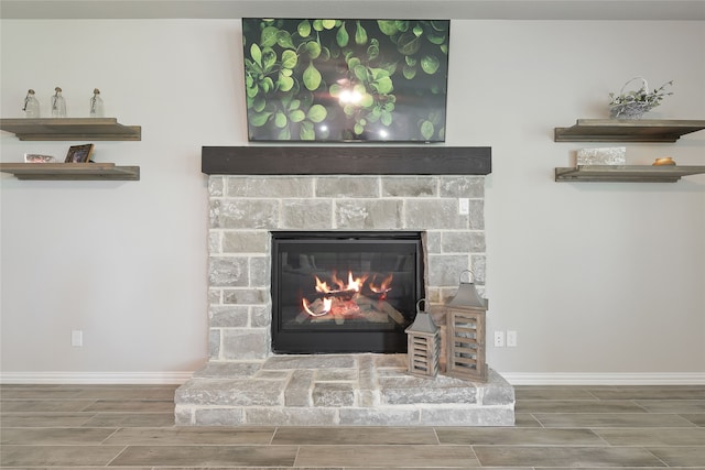 1420 Whitetail Ln, Azle, TX 76020 - detailed view of wood finish floors and a stone fireplace