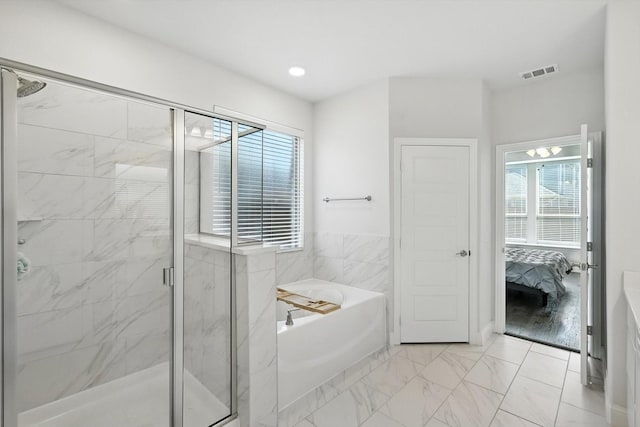 4336 Westminster Ave, Celina, TX 76227 - full bath featuring a bath, a marble finish shower, ensuite bathroom, plenty of natural light, and recessed lighting