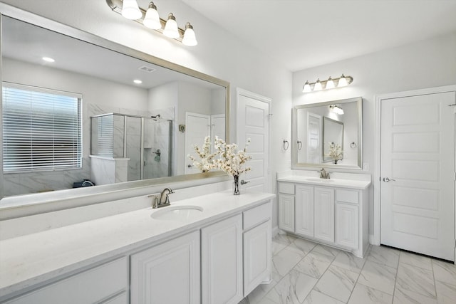 4336 Westminster Ave, Celina, TX 76227 - full bathroom with a marble finish shower, marble look tiles, two vanities, and recessed lighting