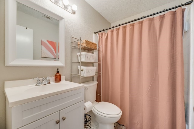 1833 Alonsdale Dr, Garland, TX 75040 - full bath with a textured ceiling, a textured wall, vanity, and a shower with shower curtain