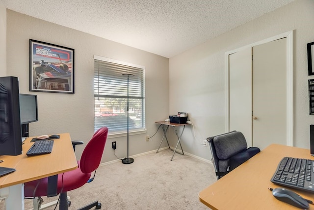 1833 Alonsdale Dr, Garland, TX 75040 - carpeted home office with a textured ceiling and baseboards