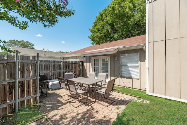 1833 Alonsdale Dr, Garland, TX 75040 - view of patio / terrace with french doors, outdoor dining area, and grilling area
