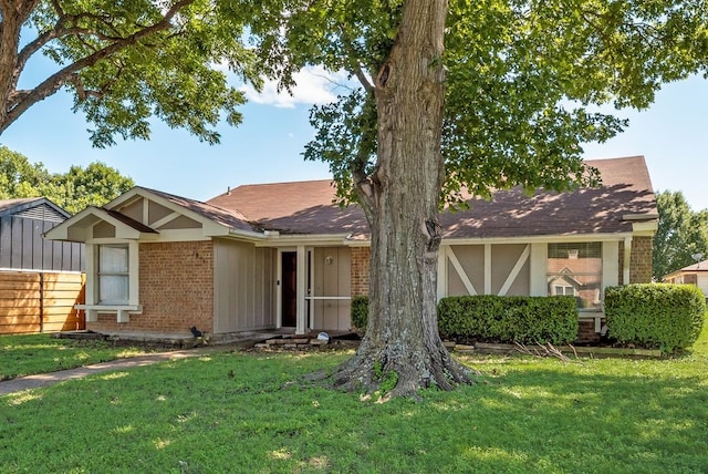 1833 Alonsdale Dr, Garland, TX 75040 - view of front of property with a front lawn and brick siding