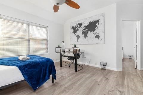 1918 Palace Dr, Grand Prairie, TX 75050 - bedroom featuring wood finished floors and a ceiling fan