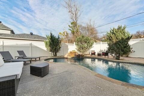 1918 Palace Dr, Grand Prairie, TX 75050 - view of pool with a patio and a fenced backyard