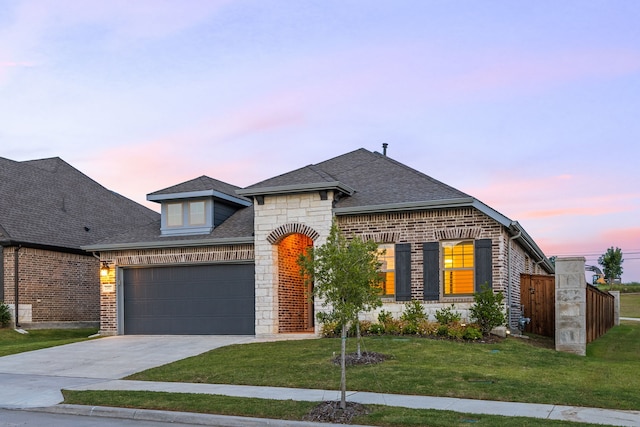2102 Clearwater Way, Royse City, TX 75189 - french country home with brick siding, roof with shingles, an attached garage, and concrete driveway
