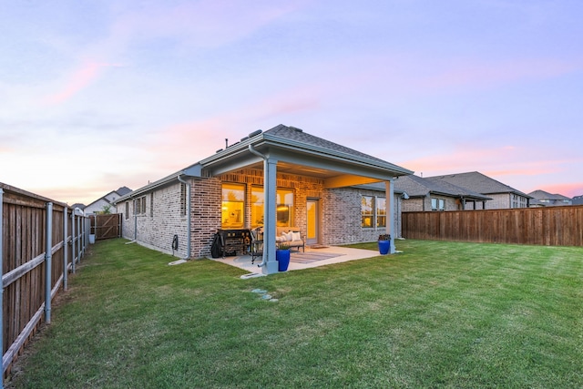 2102 Clearwater Way, Royse City, TX 75189 - back of house with brick siding, a fenced backyard, and a patio area