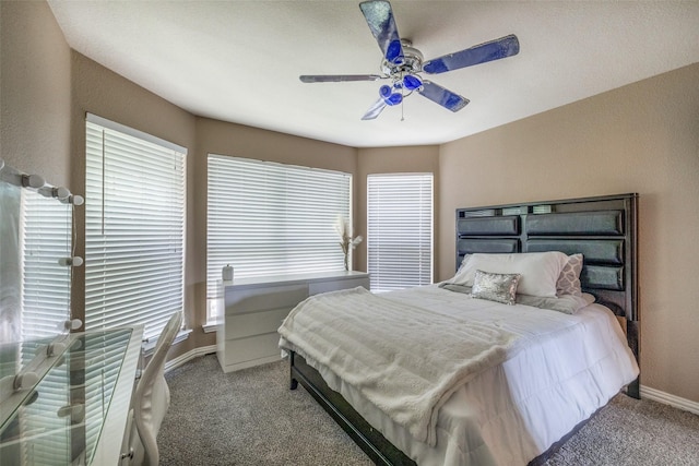 701 Parkhill Dr, Mansfield, TX 76063 - carpeted bedroom featuring baseboards and ceiling fan