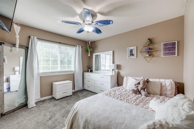 701 Parkhill Dr, Mansfield, TX 76063 - bedroom with light colored carpet and ceiling fan