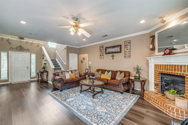701 Parkhill Dr, Mansfield, TX 76063 - living room with stairs, ceiling fan, wood finished floors, recessed lighting, and a brick fireplace