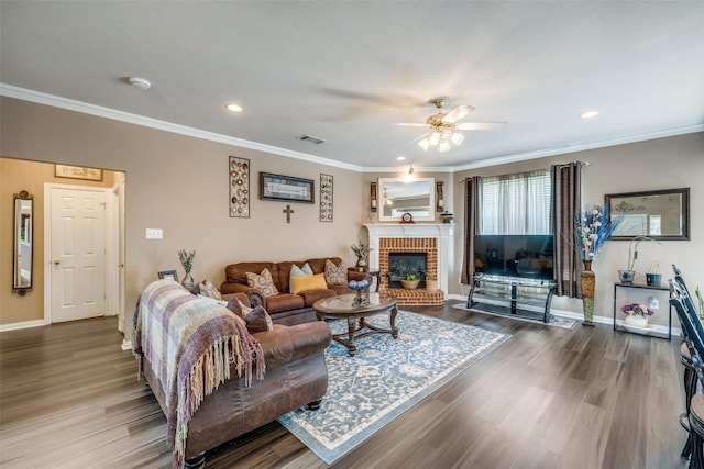 701 Parkhill Dr, Mansfield, TX 76063 - living area with wood finished floors, a ceiling fan, crown molding, recessed lighting, and a fireplace