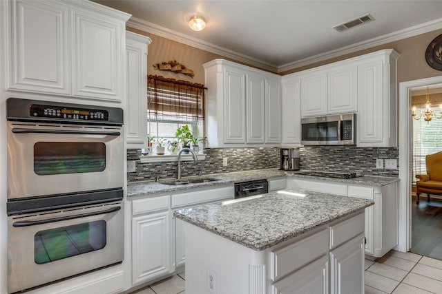 701 Parkhill Dr, Mansfield, TX 76063 - kitchen with black appliances, light tile patterned floors, white cabinets, and crown molding