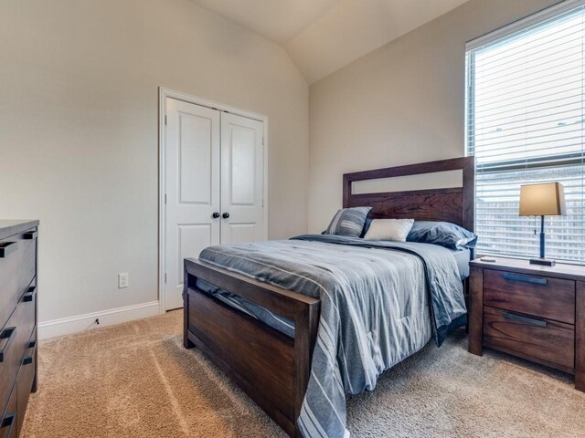 1314 Greenrock Ct, Midlothian, TX 76065 - bedroom with light colored carpet, lofted ceiling, and a closet