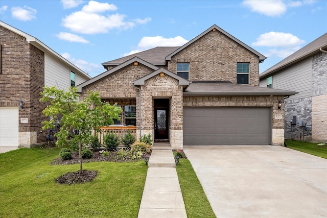 5223 Amistad Ave, Royse City, TX 75189 - view of front facade with concrete driveway, a front lawn, a garage, and brick siding