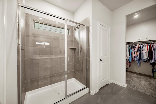 5223 Amistad Ave, Royse City, TX 75189 - bathroom featuring a shower stall, tile patterned floors, a spacious closet, and recessed lighting