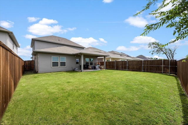 5223 Amistad Ave, Royse City, TX 75189 - rear view of house with a fenced backyard and a patio