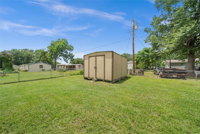 6753 Murphy St, Murchison, TX 75778 - fenced backyard with a storage unit