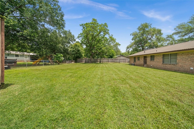 6753 Murphy St, Murchison, TX 75778 - fenced backyard with a playground