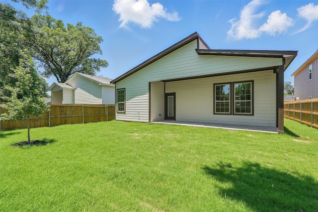 2910 Brigham Ln, Dallas, TX 75215 - back of house with a fenced backyard and a patio