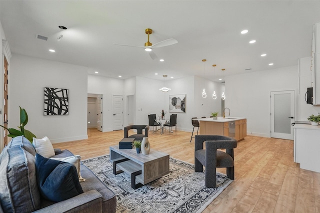 2910 Brigham Ln, Dallas, TX 75215 - living area with ceiling fan, light wood-style flooring, and recessed lighting